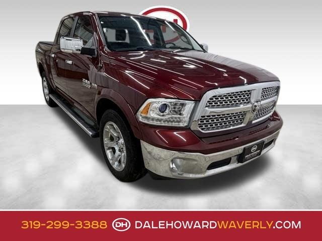 2017 RAM 1500 Laramie in Delmonico Red Pearlcoat — front three-quarter view