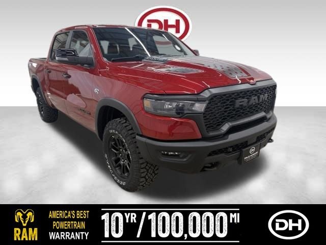 2026 RAM 1500 Rebel in Molten Red Pearl-Coat Exterior Paint — front three-quarter view