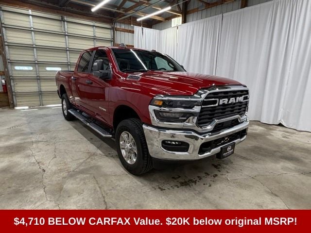 2026 RAM 2500 Big Horn in Molten Red Pearlcoat — front three-quarter view