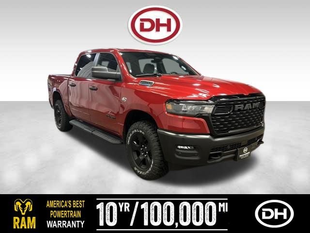 2026 RAM 1500 Warlock in Molten Red Pearlcoat — front three-quarter view