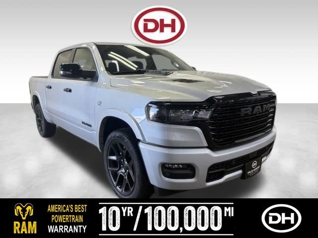 2026 RAM 1500 Laramie in Silver Zynith — front three-quarter view