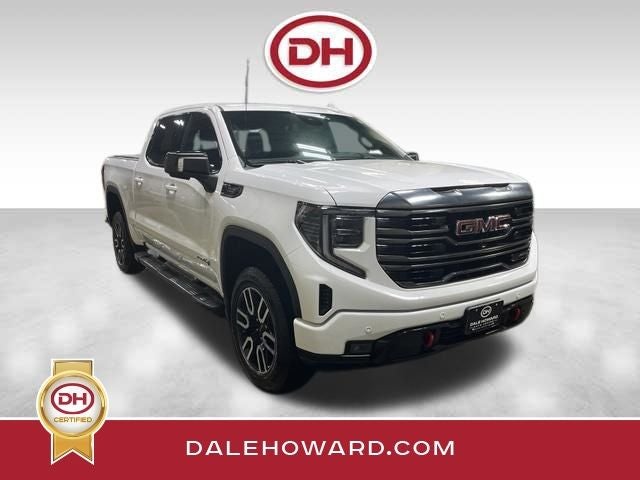 2023 GMC Sierra 1500 AT4 in Summit White — front three-quarter view