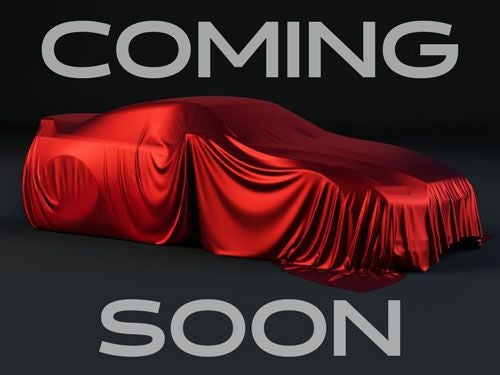 2016 Dodge Grand Caravan SXT in Redline 2 Coat Pearl — front three-quarter view