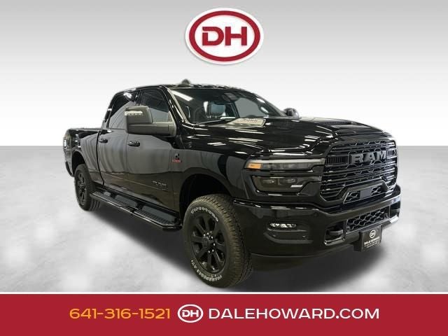 2026 RAM 2500 Laramie in Diamond Black Crystal Pearlcoat — front three-quarter view